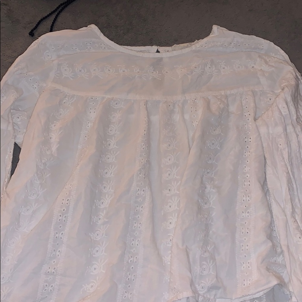 super cute and fancy white blouse with cool design